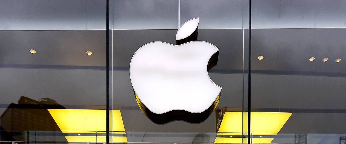 APPLE store and logo. Apple Inc. is an American multinational technology company headquartered in California.